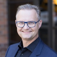 Headshot of Mark Mueller-Eberstein